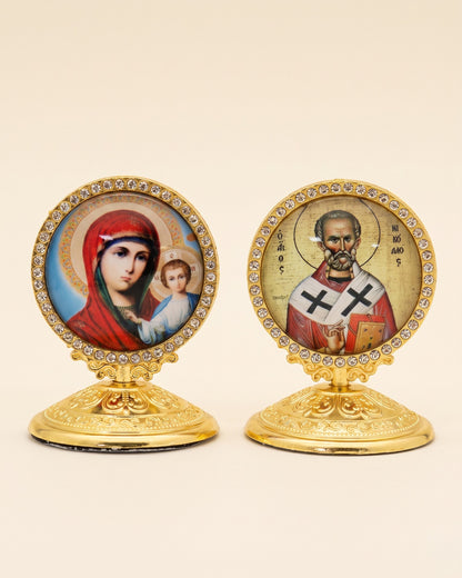 Pair of standing icon ornaments with rhinestone borders on gold pedestal bases