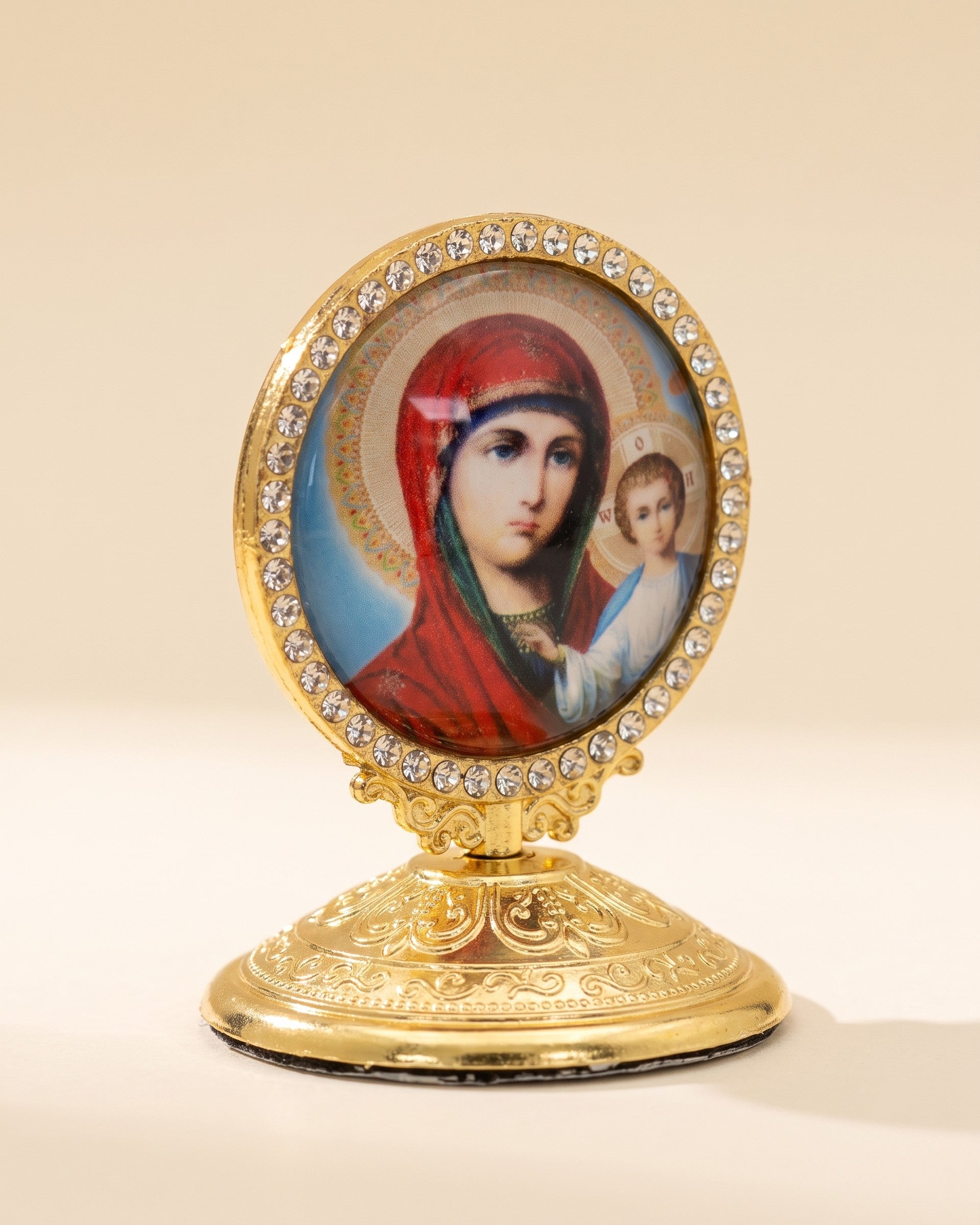 Close view of a single standing icon ornament and its rhinestone border