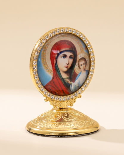 Close view of a single standing icon ornament and its rhinestone border