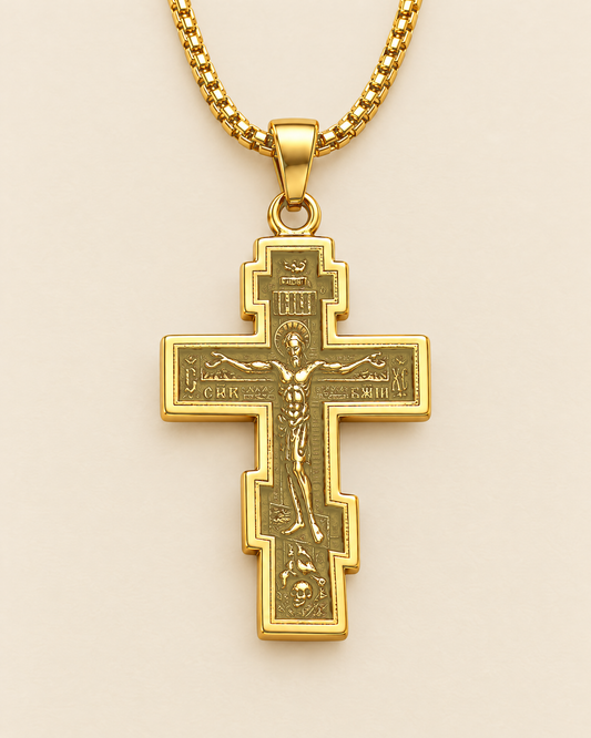 Gold stainless steel Orthodox cross pendant, solid gold tone, on its chain